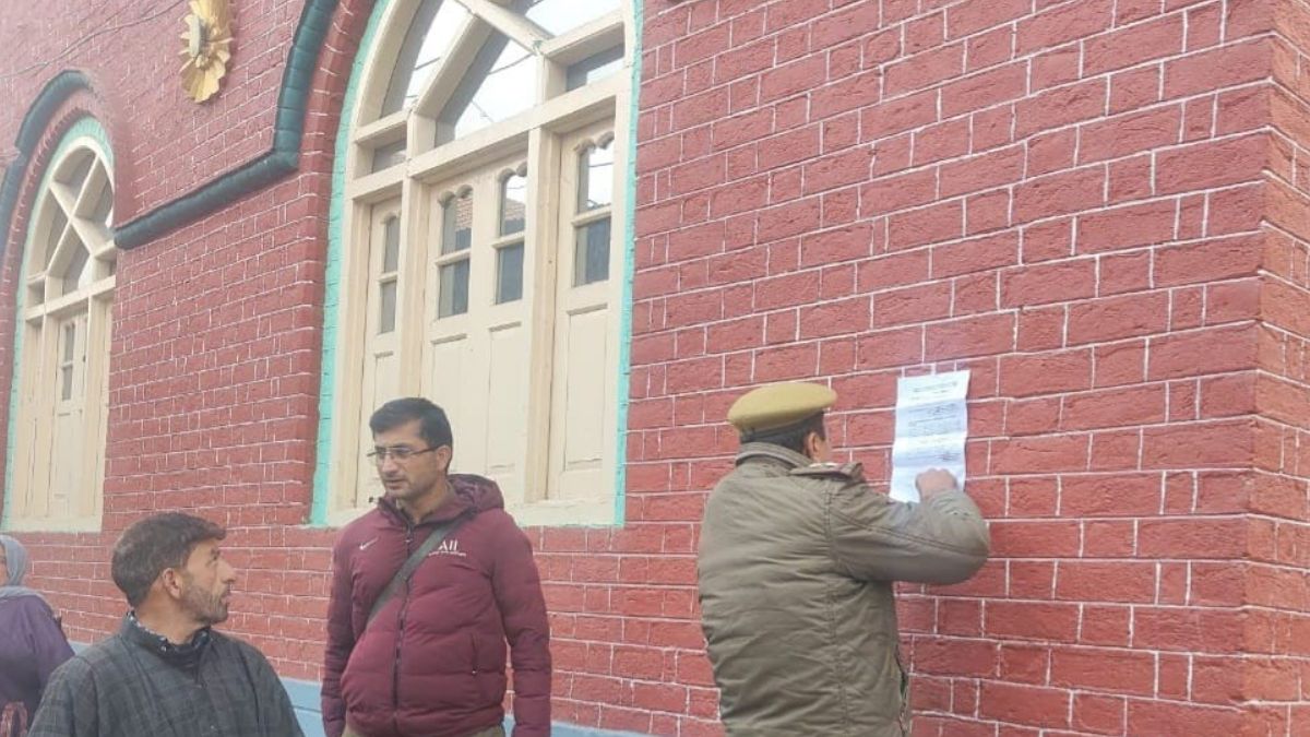 preparations to confiscate the property of pulwama attack mastermind aashiq nengroo court order pasted on his house