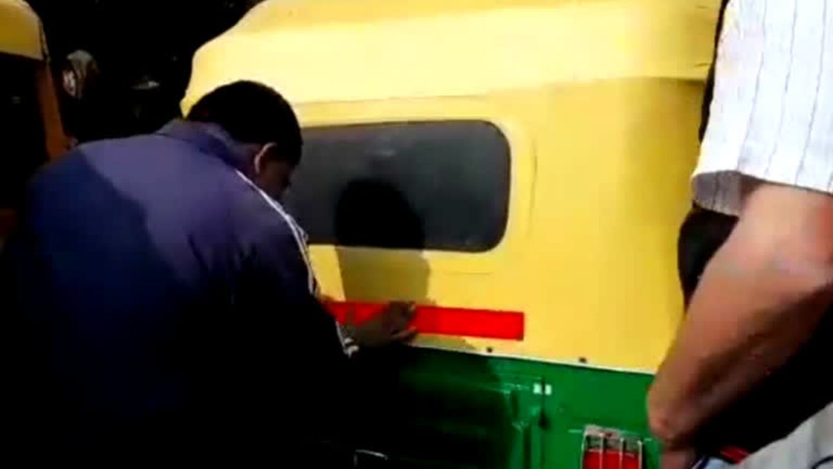 faridabad police install reflective tape on vehicles for safe traffic