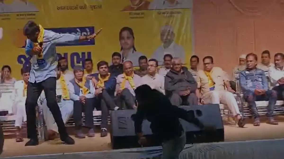 gujarat shoe thrown at aap mla gopal italia in jamnagar angry workers beat up the attacker