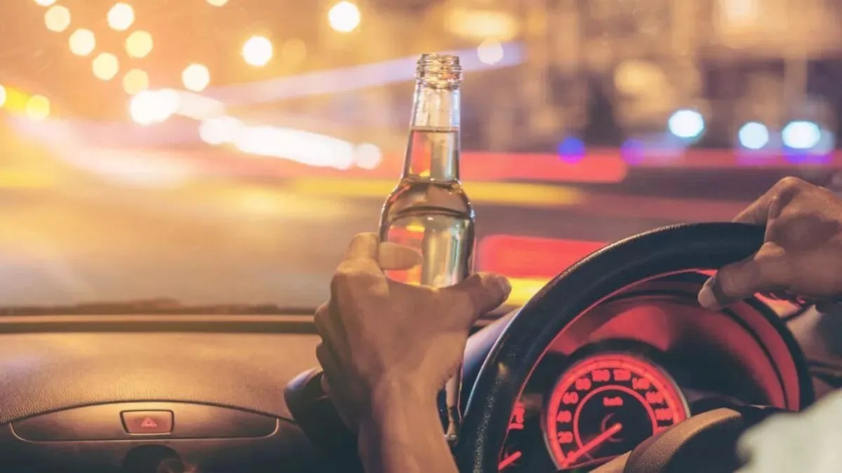 liquor seized from a hidden box in the trunk and dashboard of a car in muzaffarpur two arrested