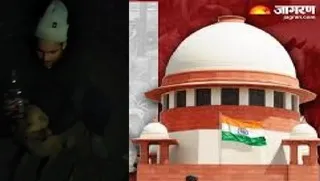 कुत्ते को शराब पिलाता युवक। वीडियो ग्रैब
