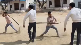 युवक ने सरकारी स्कूल प्रिंसिपल पर लाठी से हमला किया (स्क्रीनग्रैब)