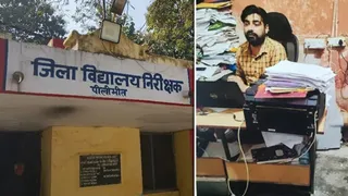 डीआईओएस कार्यालय में कार्य करता हुआ इल्हाम शमसी। स्रोत इंटरनेट मीडिया