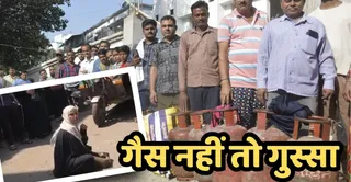 पुलिस लाइन स्थित गैस गोदाम के बाहर गैस सिलिंडर लेने के लिए लगी उपभोक्ता की लाइन व भागवत गैस एजेंसी में गैस न मिलने पर सड़क पर बैठी महिला। जागरण