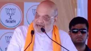 पश्चिम बंगाल के कुशलडी बुरु मैदान में चुनावी सभा को संबोधित करते केंद्रीय गृहमंत्री अमित शाह।