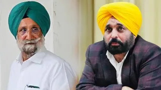 कांग्रेस सांसद सुखजिंदर सिंह और सीएम भगवंत मान (जागरण फाइल)