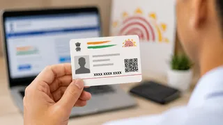 आधार में कितनी बार बदल सकते हैं नाम मोबाइल नंबर और एड्रेस (AI द्वारा जनरेटेड फोटो)