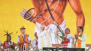 जनजातीय समागम के दौरान अमित शाह। फाइल फोटो
