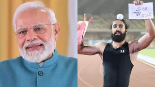 प्रधानमंत्री नरेंद्र मोदी व धावक गुरिंदरवीर सिंह।