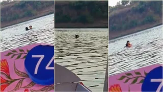 गौरीघाट पर स्नान के दौरान युवक-युवती ने की आपत्तिजनक हरकत (वीडियो ग्रैब)