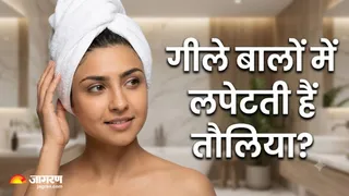 गीले बालों को तौलिए में कसकर लपेटना कितना सही? (Image Source: AI-Generated)