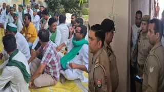 सोमवाल नर्सिंग होम परिसर में धरने पर बैठे भाकियू कार्यकर्ता, छापेमारी की कार्रवाई के दौरान मौजूद पुलिस। जागरण