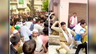 बिथरी क्षेत्र के गांव पदारथपुर में विवाद के दौरान भीड़ और भीड़ को खदेड़ती पुलिस