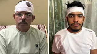 घायल दारोगा नवीन भारद्वाज और उनका बेटा दिव्यांशु भारद्वाज ।