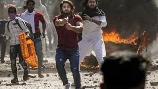 दिल्ली दंगे के दौरान शाहरुख पठान ने तानी थी पुलिसवाले में पिस्तौल। जागरण आर्काइव
