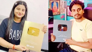 यूट्यूब का गोल्ड बटन दिखातीं वैष्णवी पटेल और सिल्वर बटन दिखाते मनोज कुमार।