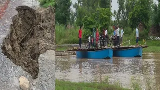 रावली कण्व आश्रम से मध्य गंगा बैराज के बीच गंगा तटबन्ध की ध्वस्त एप्रोच, दो नाव को जोड़कर पार कराया जा रहा मालन का रपटा।