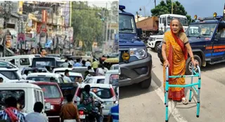 जाम में वॉकर से चलती महिला। जागरण
