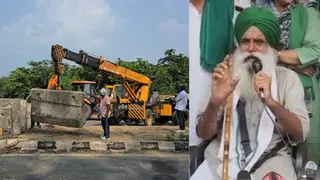 किसानों को रोकने के लिए लगाए गए सीमेंट ब्लॉक हटाते हुए किसान व जानकारी देते हुए किसान नेता डल्लेवाल।