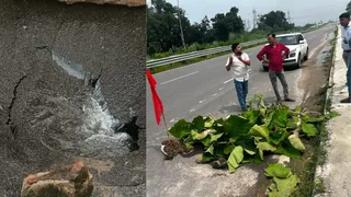प्रयागराज-लखनऊ हाईवे पर बरई गांव के पास बना गड्ढा व पत्थरों व पत्तों से घेरा गया है। जागरण