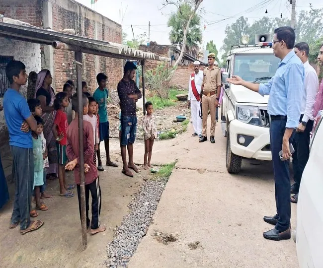 Commissioner interacting with school children in Jasra of Prayagraj