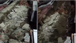 सोलन में सड़क धंसने से हुए भूस्खलन के कारण मकान क्षतिग्रस्त हो गया।