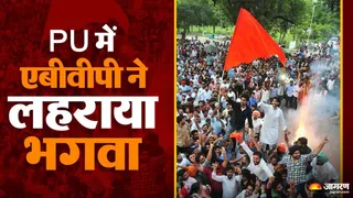 पीयू में प्रधान पद पर जीत के बाद भगवा लहराते एबीवीपी के अंकित बिढा़न। फोटो : उपेंद्र सेन गुप्ता