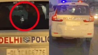 दिल्ली पुलिस की पीसीआर में शराब पीने का वीडियो वायरल। फोटो: वीडियो ग्रैब