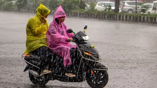 मानसून की अभी नहीं होगी विदाई (फोटो-पीटीआई)
