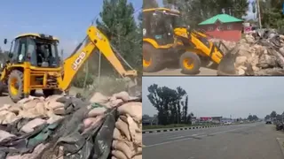 अनंतनाग में सड़क किनारे सुरक्षा बंकर हटाया गया।