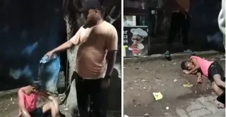 नशे में धुत्त युवक के ऊपर जो युवक पानी डाल रहा है उसी ने बाद में उसी के ऊपर लघु शंका भी की। वीडियो ग्रैब