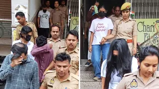 लखनऊ में गुरुवार को कपूरथला पुलिस चौकी के पास चल रहे कॉल सेंटर में छापे के दौरान आरोपियों को हिरासत में लेकर जाते पुलिसकर्मी। जागरण