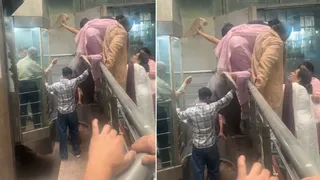 शिमला बस स्टैंड में लिफ्ट में फंसे लोगों को रेस्क्यू करते हुए। जागरण