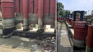 भाखड़ा डैम पर पड़ी दरार और डैम पर कटा तटबंध। जागरण
