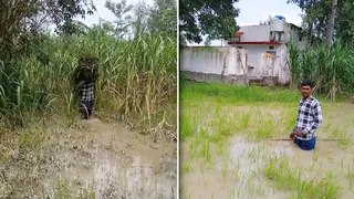 नाववाला गांव के खेतों में भरा बाढ़ के पानी और बाढ़ के पानी में खड़े होकर फसल बर्बादी देखते किसान जागरण आर्काइव