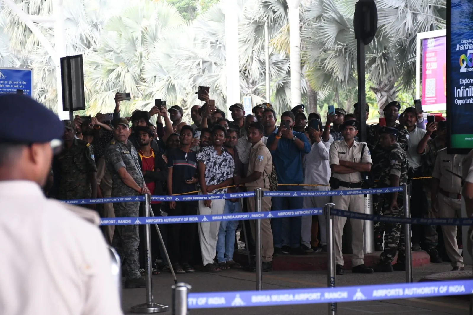 cricket fans at airport