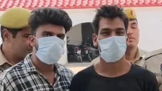 पुलिस गिरफ्त में आरोपित।