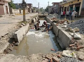 फरुखनगर में नाले के निर्माण में अनियमितताएं ( एआई इमेज )