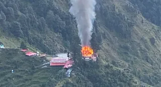 मंदिर में लगी आग। जागरण