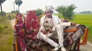 बैलगाड़ी में दूल्हा-दुल्हन। फोटो जागरण