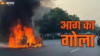 प्रयागराज के नैनी स्थित लेप्रोसी चौराहे के पास कार में आग लग गई। जागरण आर्काइव