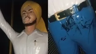मोगा के गांव में स्थापित शहीद भगत सिंह की प्रतिमा और पेंट पर लगा पेंट।