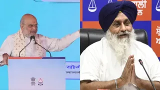 दिल्ली में कार्यक्रम के दौरान अमित शाह और अकाली दल अध्यक्ष सुखबीर बादल।