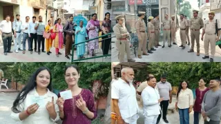 पोलिंग बूथ पर मतदान करने पहुंचे मतदाता।