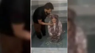स्विमिंग पुल में डुबोकर धर्म परिवर्तन। वीडियो से ली गई तस्वीर