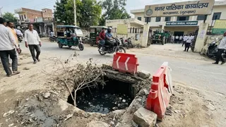 फरुखनगर में खुले सीवर से हादसे का डर ( एआई जेनरेटेड इमेज )