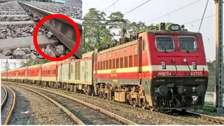 घटना के बाद रेल पटरी की मरम्मत करते रेलवे कर्मी और सुरक्षा अधिकारी