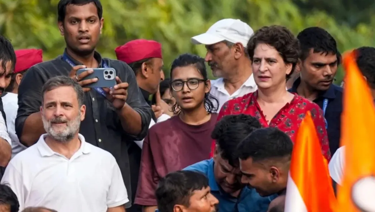 Neha Bora with Rahul Gandhi and Priyanka Gandhi