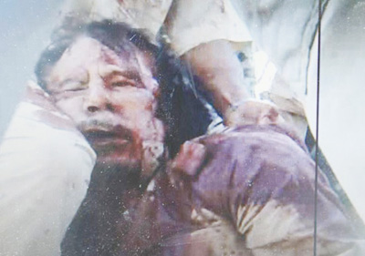 Donchar(39)t shootchar(39), pleaded Gaddafi when captured