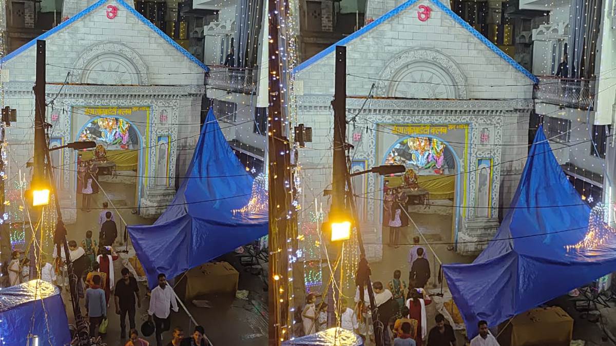 crowds of devotees gathered to see maa durga amidst heavy rain praying to maa bhavani and praying for happiness and prosperity